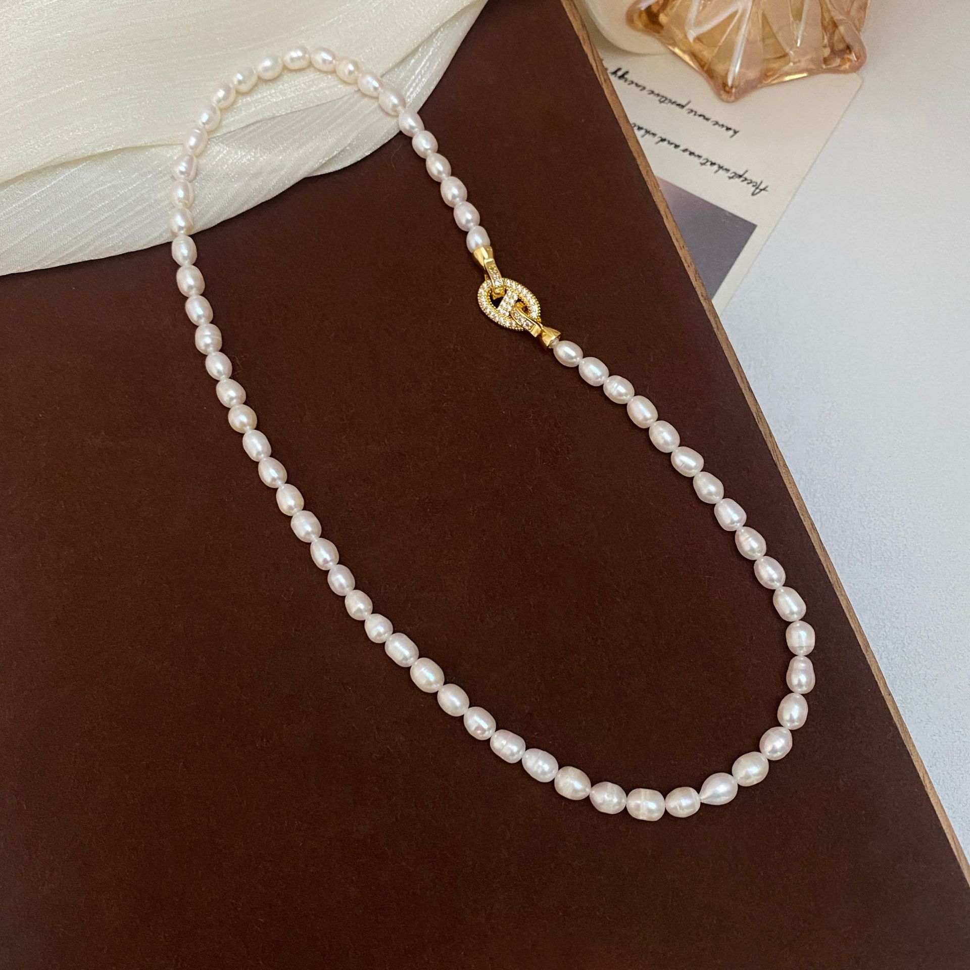 عالية الجودة العصرية لامعة كري - مراجعة Pearl Trim Chain وسعره